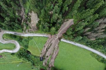 Heavy rain triggered flood and landslides which cut roads in San Martino in Badia, Italy, 05 August 2022. 